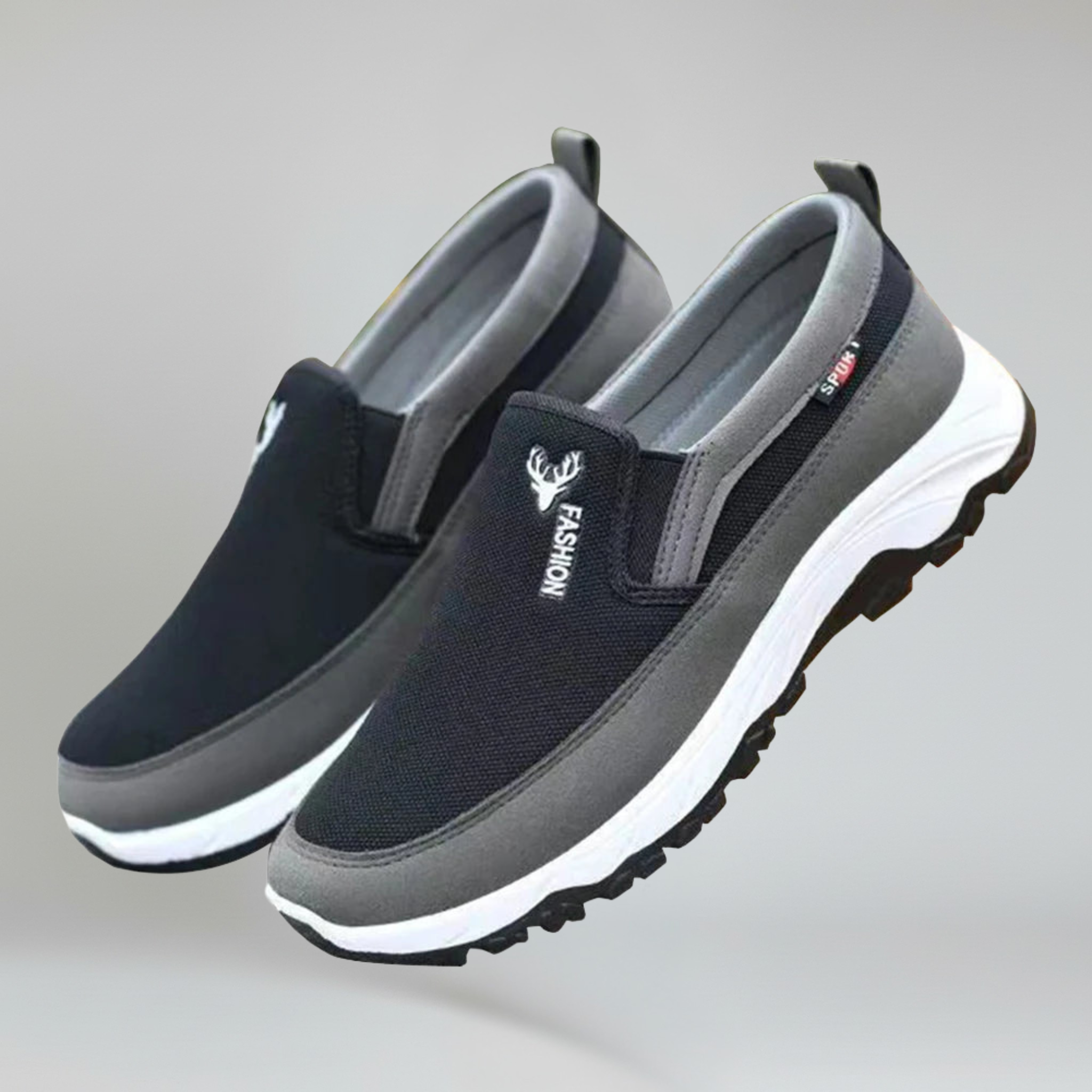 a pair of black boat shoes for men on a plain background