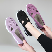 women's slip-on sneakers on a plain background