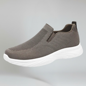 women's dark grey walking shoes on a plain background