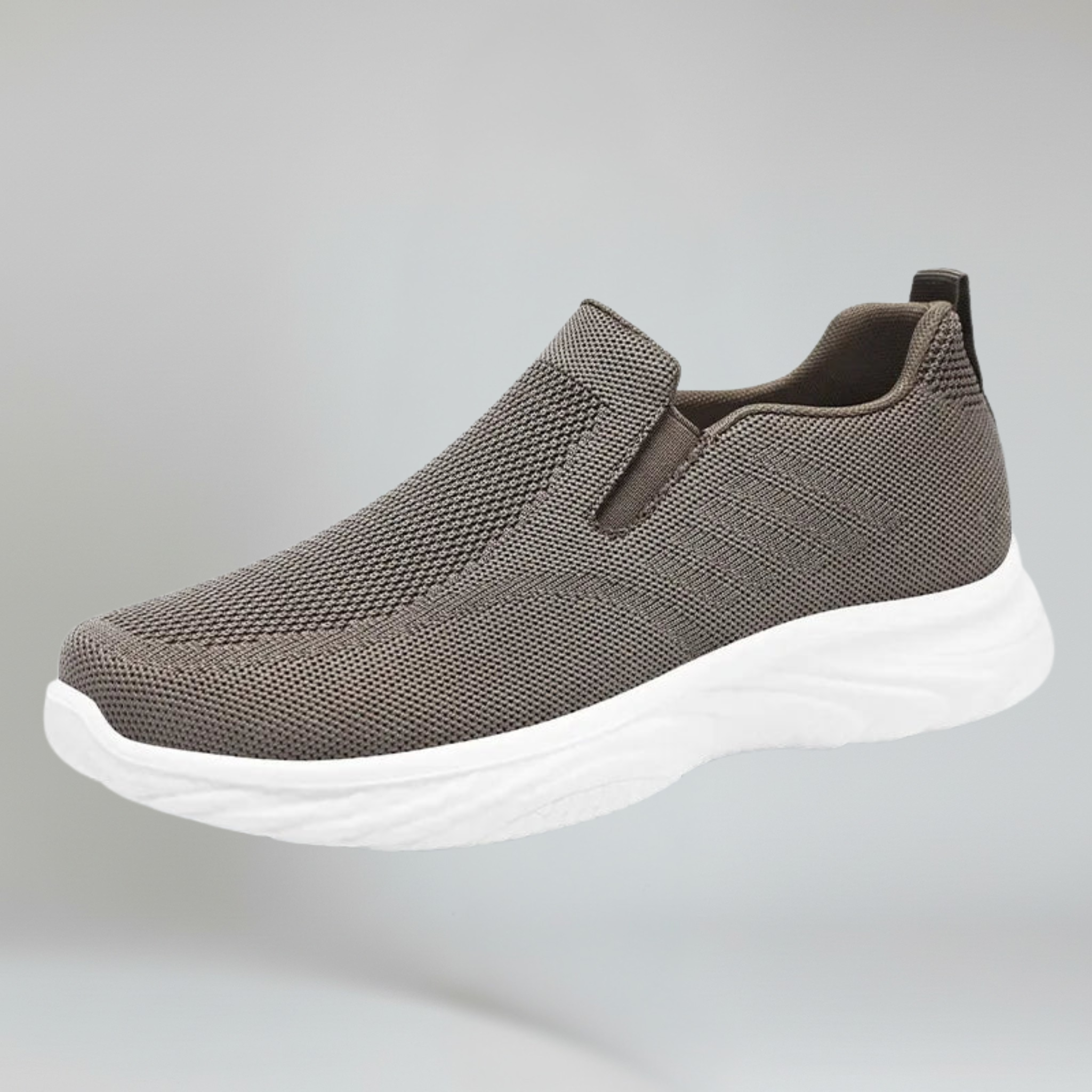 women's dark grey walking shoes on a plain background